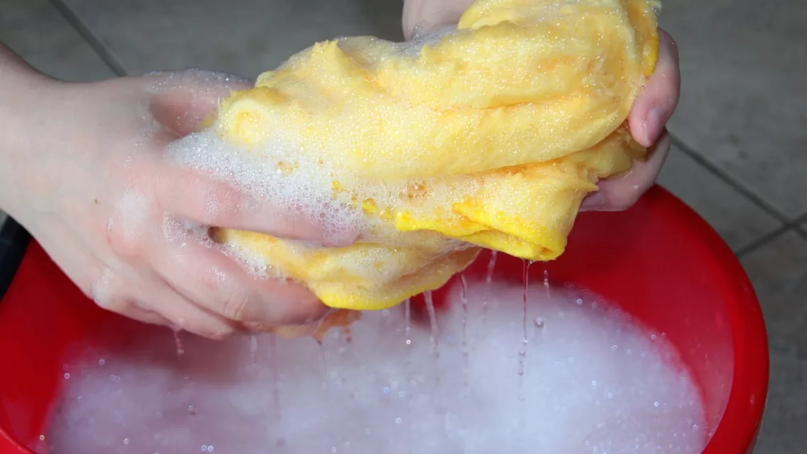 cleaning bucket, cleaning rags, soapy water